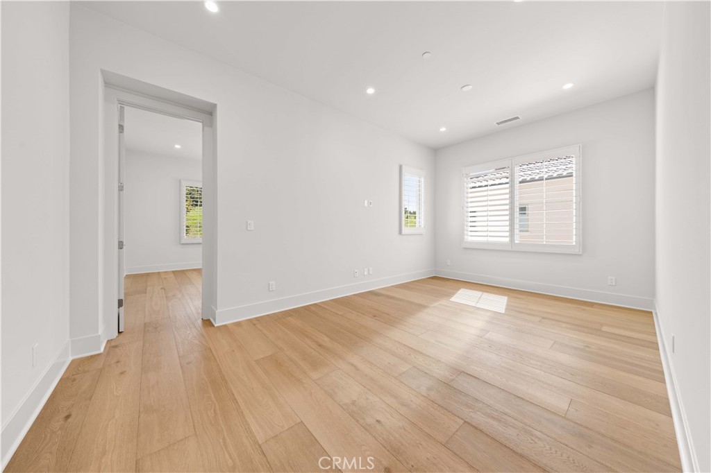 233 Pinnacle Irvine, CA 92602 - Photo 40 of 64 wooden floor in an empty room with a window