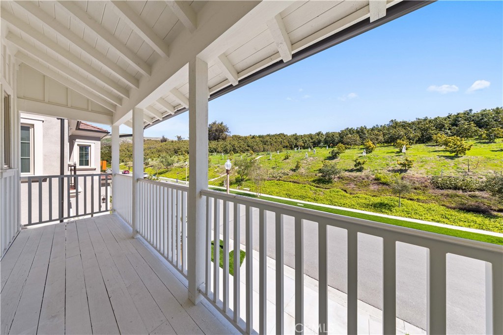 233 Pinnacle Irvine, CA 92602 - Photo 48 of 64 a view of a balcony with wooden floor and outdoor space