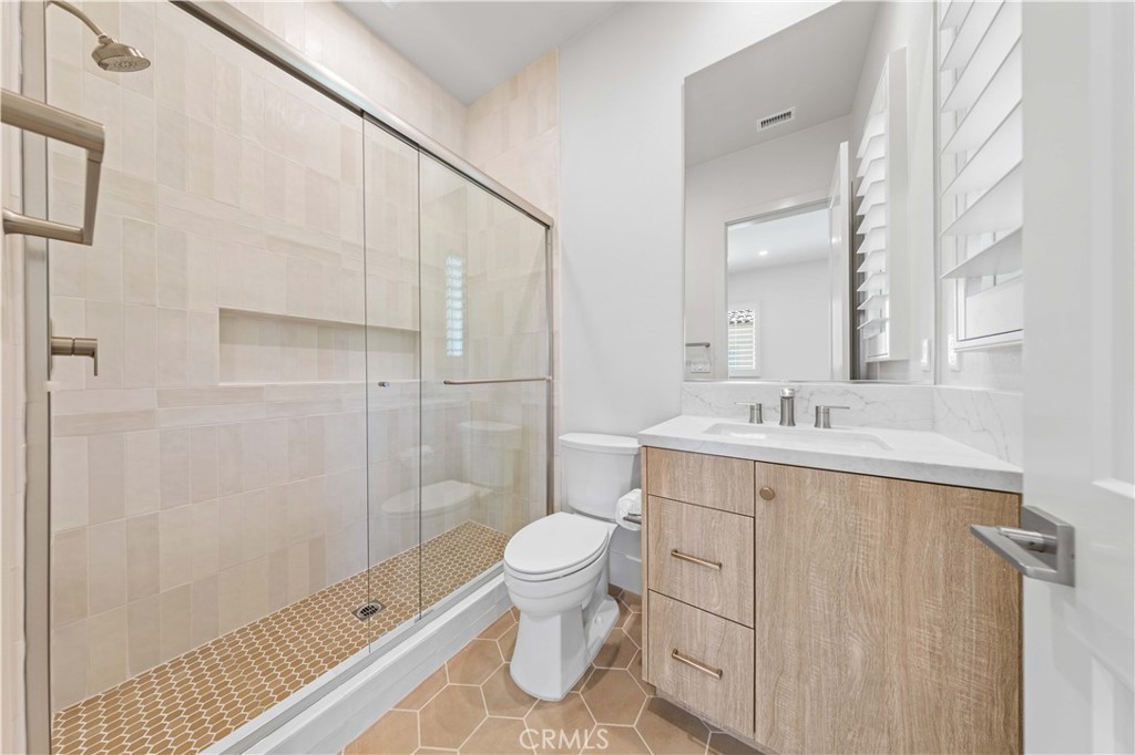 233 Pinnacle Irvine, CA 92602 - Photo 53 of 64 a bathroom with a sink toilet and shower