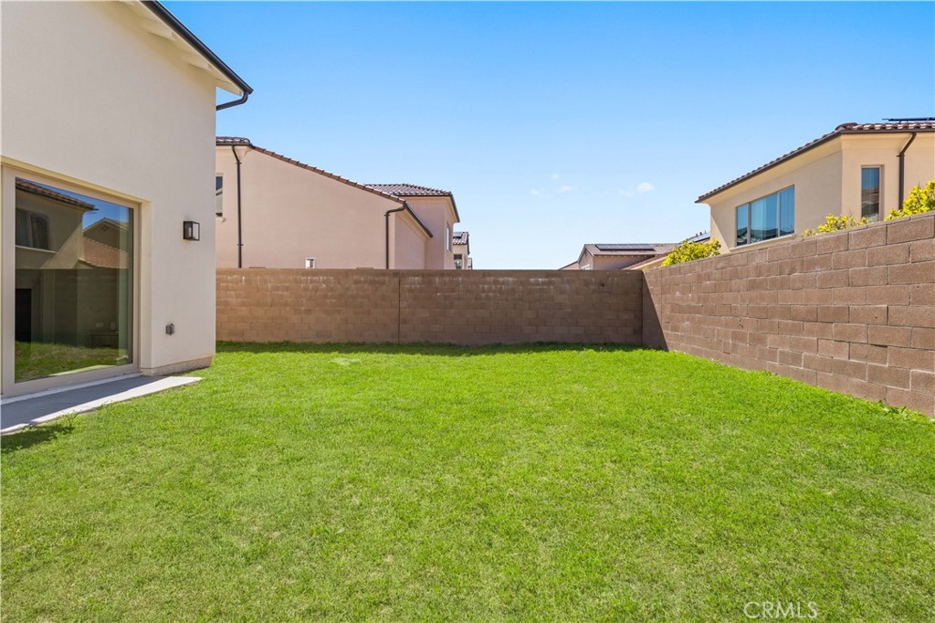 233 Pinnacle Irvine, CA 92602 - Photo 57 of 64 a view of a house with a yard
