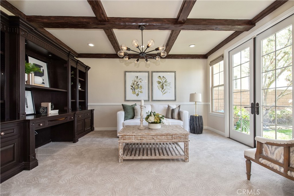 17 Ferrand Newport Coast, CA 92657 - Photo 12 of 34 a living room with furniture and a flat screen tv