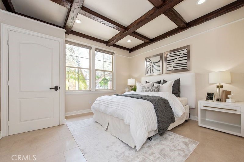 17 Ferrand Newport Coast, CA 92657 - Photo 13 of 34 a bedroom with a large bed and a window