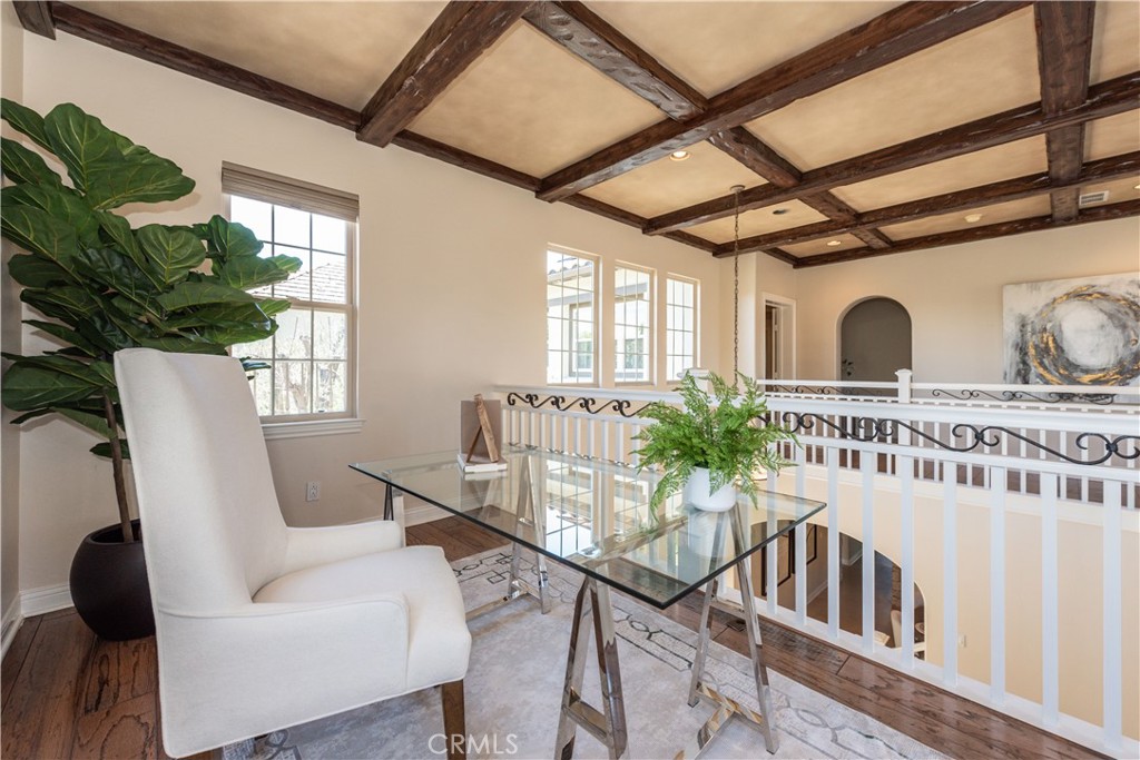 17 Ferrand Newport Coast, CA 92657 - Photo 19 of 34 a living room with furniture a chandelier and a window