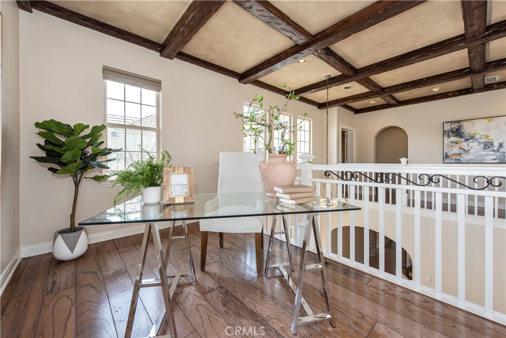 17 Ferrand Newport Coast, CA 92657 - Photo 21 of 34 a view of a porch with wooden floor and potted plants