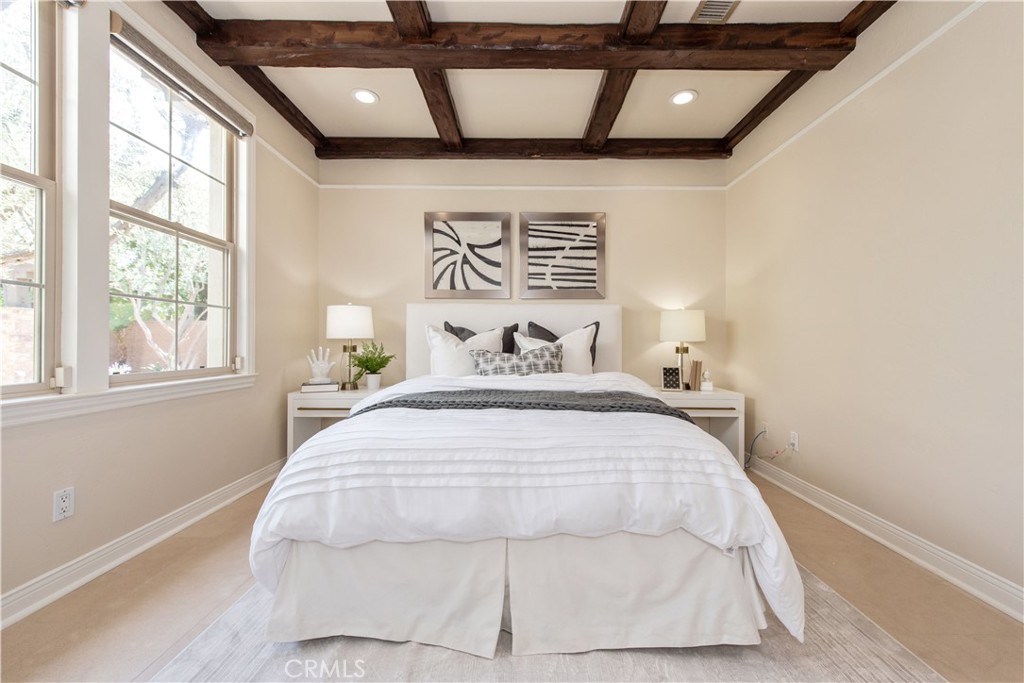 17 Ferrand Newport Coast, CA 92657 - Photo 28 of 34 a bedroom with a bed and a large window