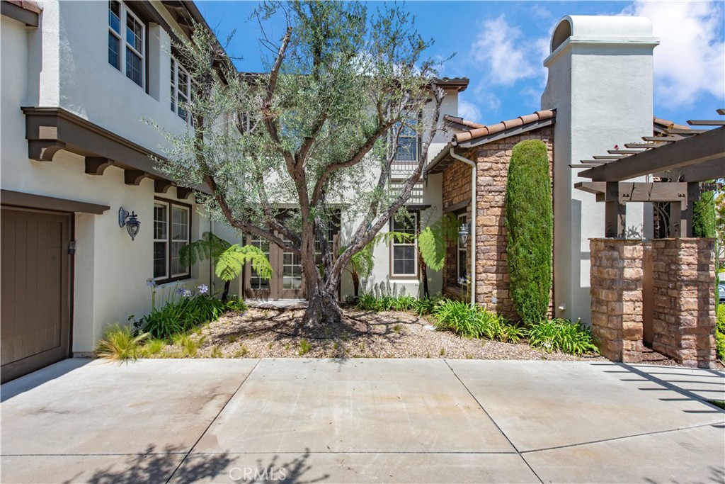 17 Ferrand Newport Coast, CA 92657 - Photo 30 of 34 a pathway of a house with a yard