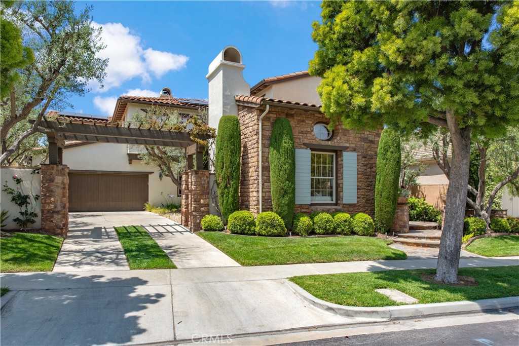 17 Ferrand Newport Coast, CA 92657 - Photo 33 of 34 a front view of a house with garden