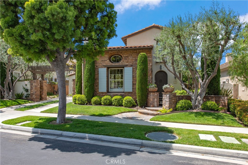 17 Ferrand Newport Coast, CA 92657 - Photo 34 of 34 a front view of a house with garden