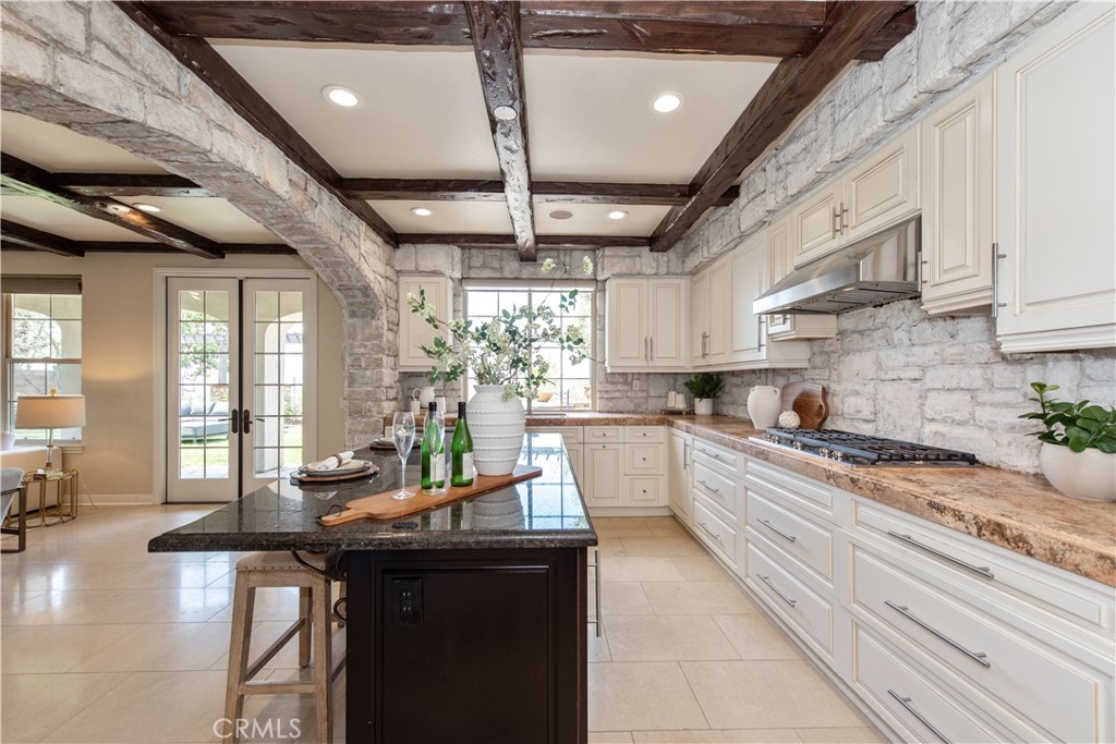 17 Ferrand Newport Coast, CA 92657 - Photo 7 of 34 a kitchen with stainless steel appliances granite countertop lots of counter top space