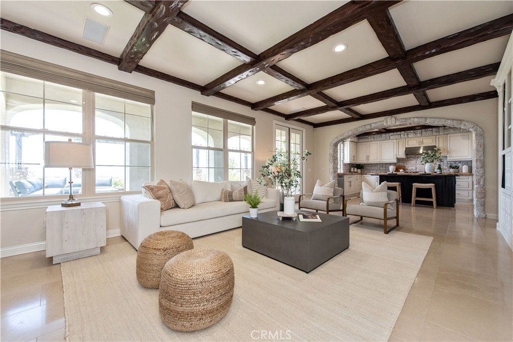 17 Ferrand Newport Coast, CA 92657 - Photo 9 of 34 a living room with furniture and a large window