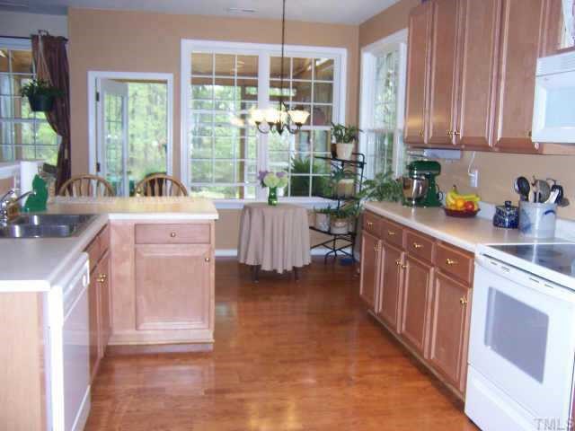 5632 Keowee Way Raleigh, NC 27616 - Photo 2 of 8 Beautiful kitchen/breakfast area opening to screened porch