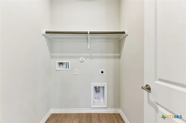 a bathroom with a sink a toilet and bathtub
