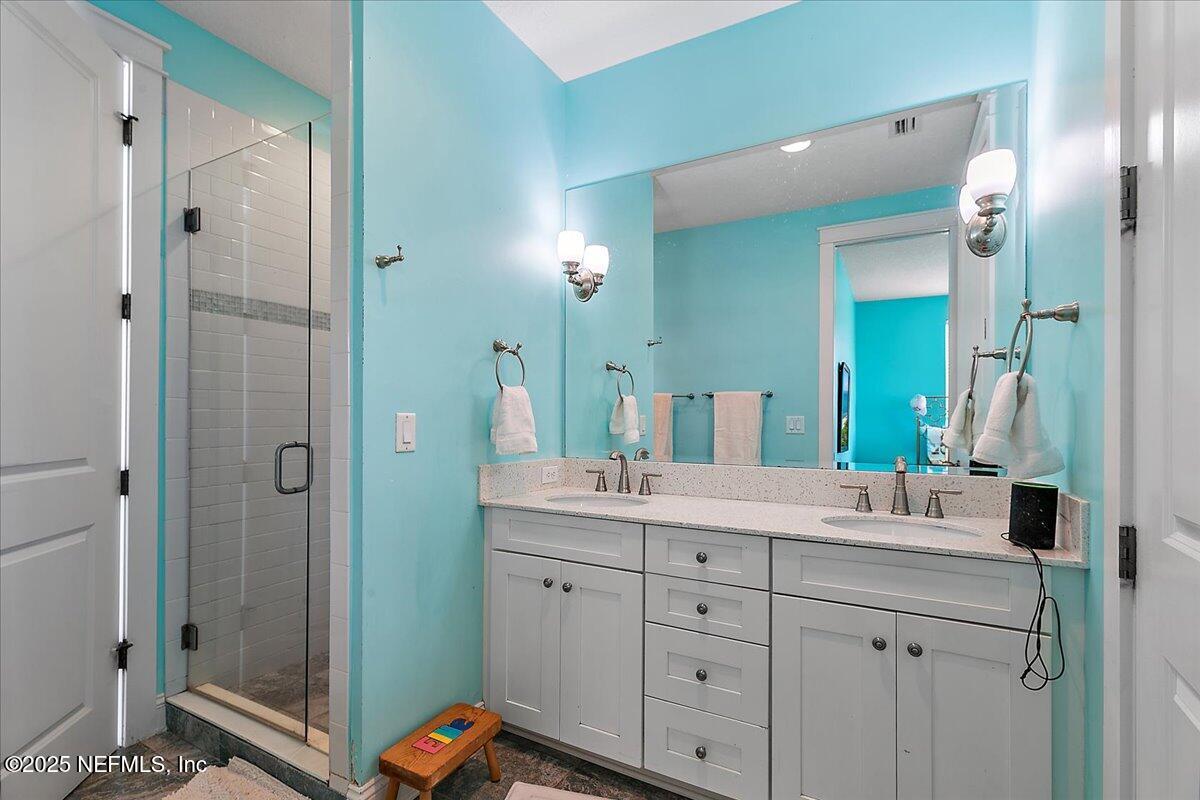 411 Ranch Road Ponte Vedra, FL 32081 - Photo 33 of 56 a bathroom with a double vanity sink mirror and double