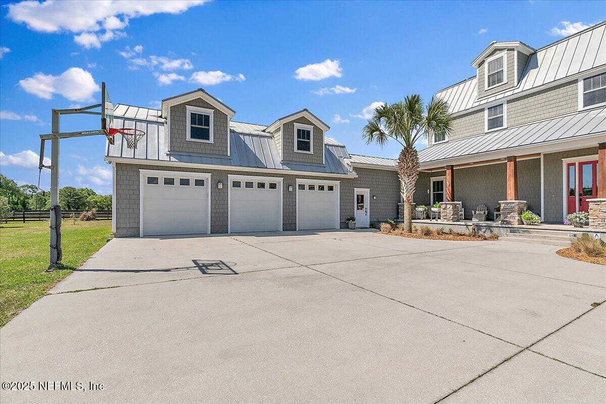 411 Ranch Road Ponte Vedra, FL 32081 - Photo 44 of 56 a front view of a building with traffic signal lights