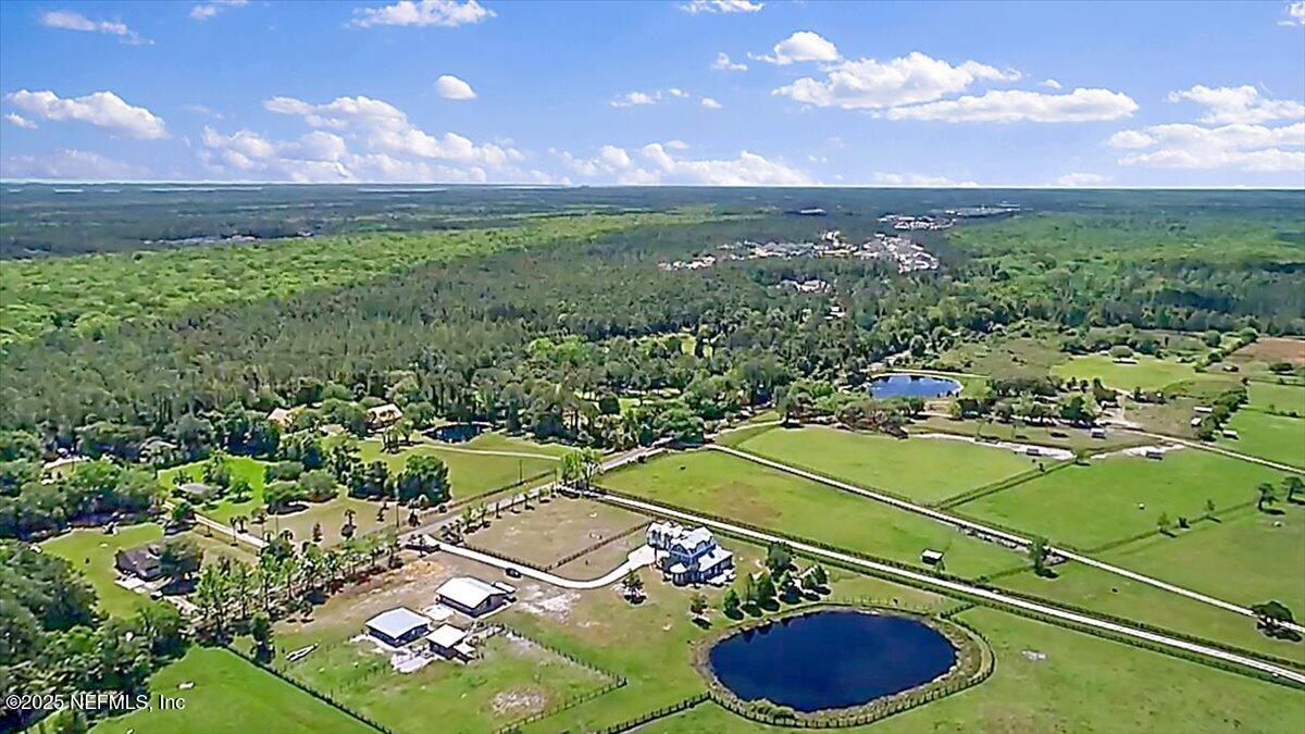 411 Ranch Road Ponte Vedra, FL 32081 - Photo 52 of 56 a view of a tennis ground with a swimming pool