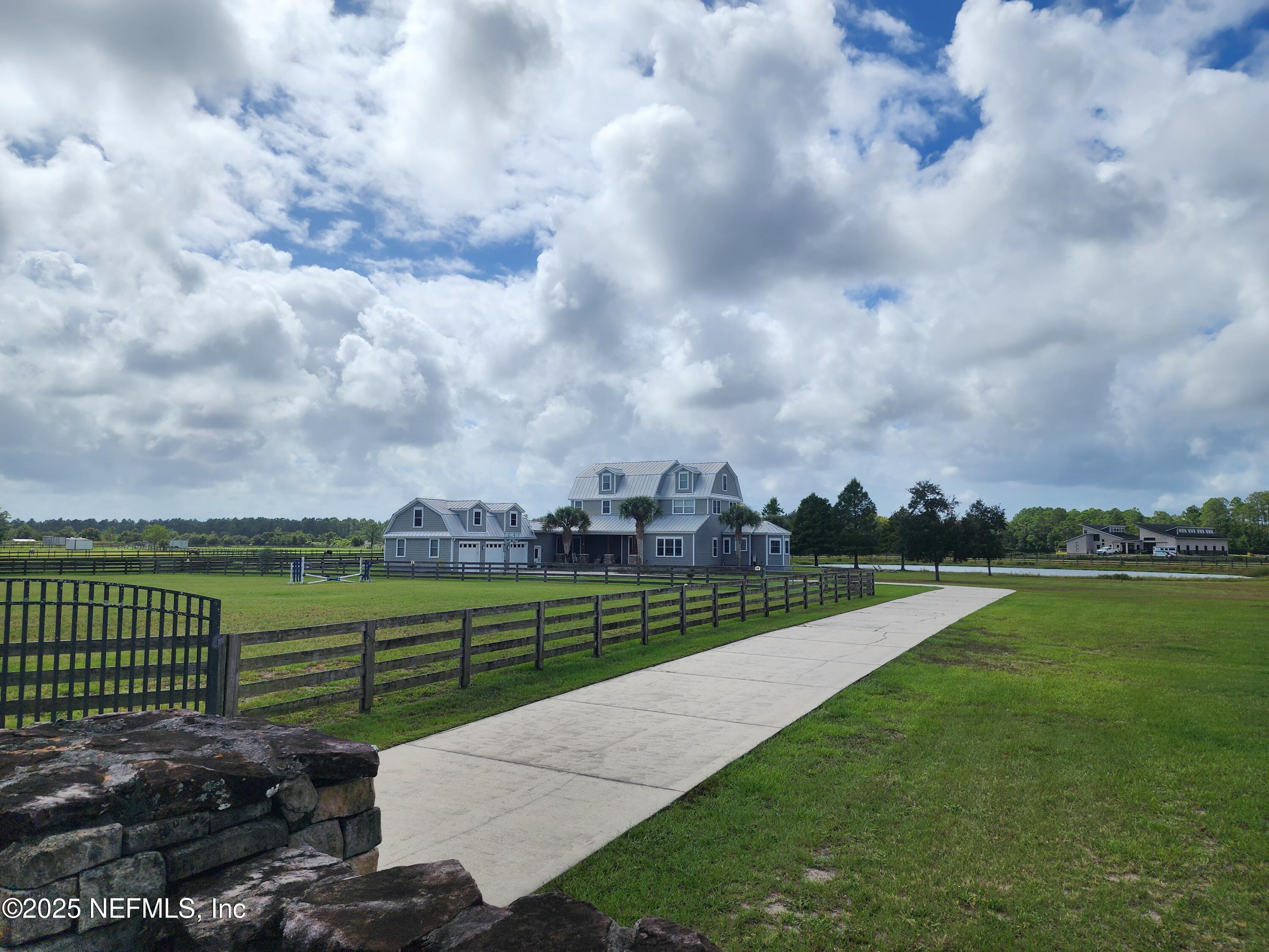 411 Ranch Road Ponte Vedra, FL 32081 - Photo 54 of 56 a view of a golf course with a garden