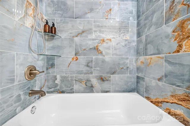 a bathroom with a bathtub