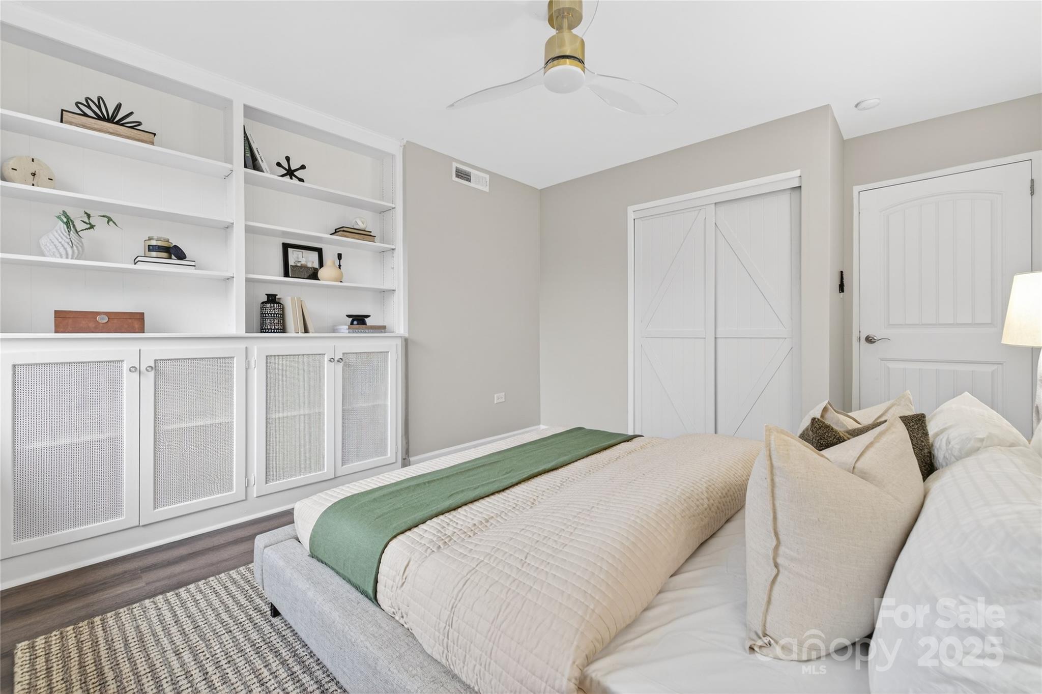 1300 Queens Road, Unit 409 Charlotte, NC 28207 - Photo 13 of 35 a bedroom with a bed and a window