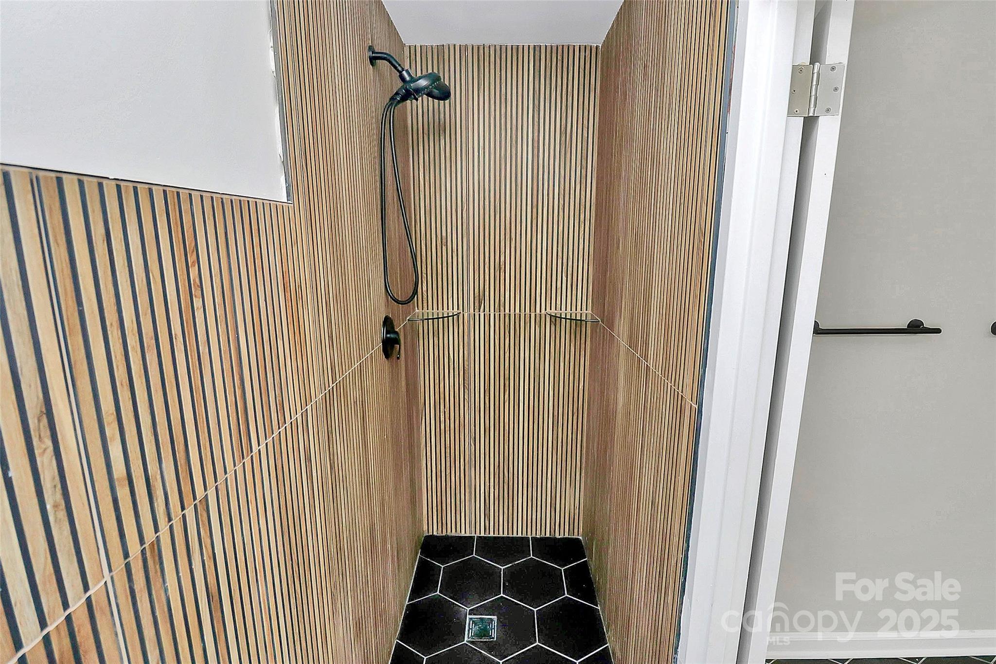 1300 Queens Road, Unit 409 Charlotte, NC 28207 - Photo 22 of 35 a view of a walk in closet