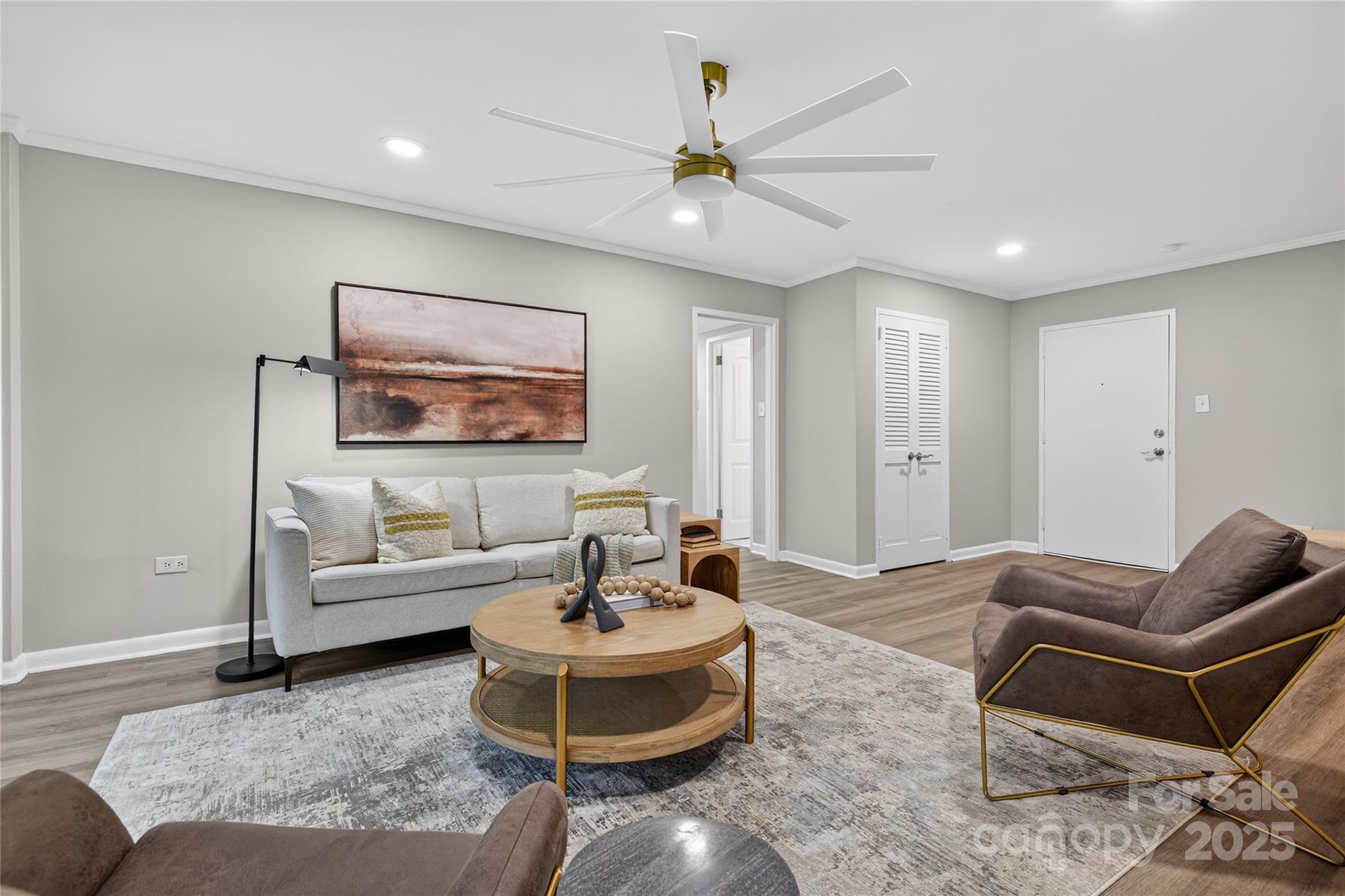 1300 Queens Road, Unit 409 Charlotte, NC 28207 - Photo 3 of 35 a living room with furniture and a rug