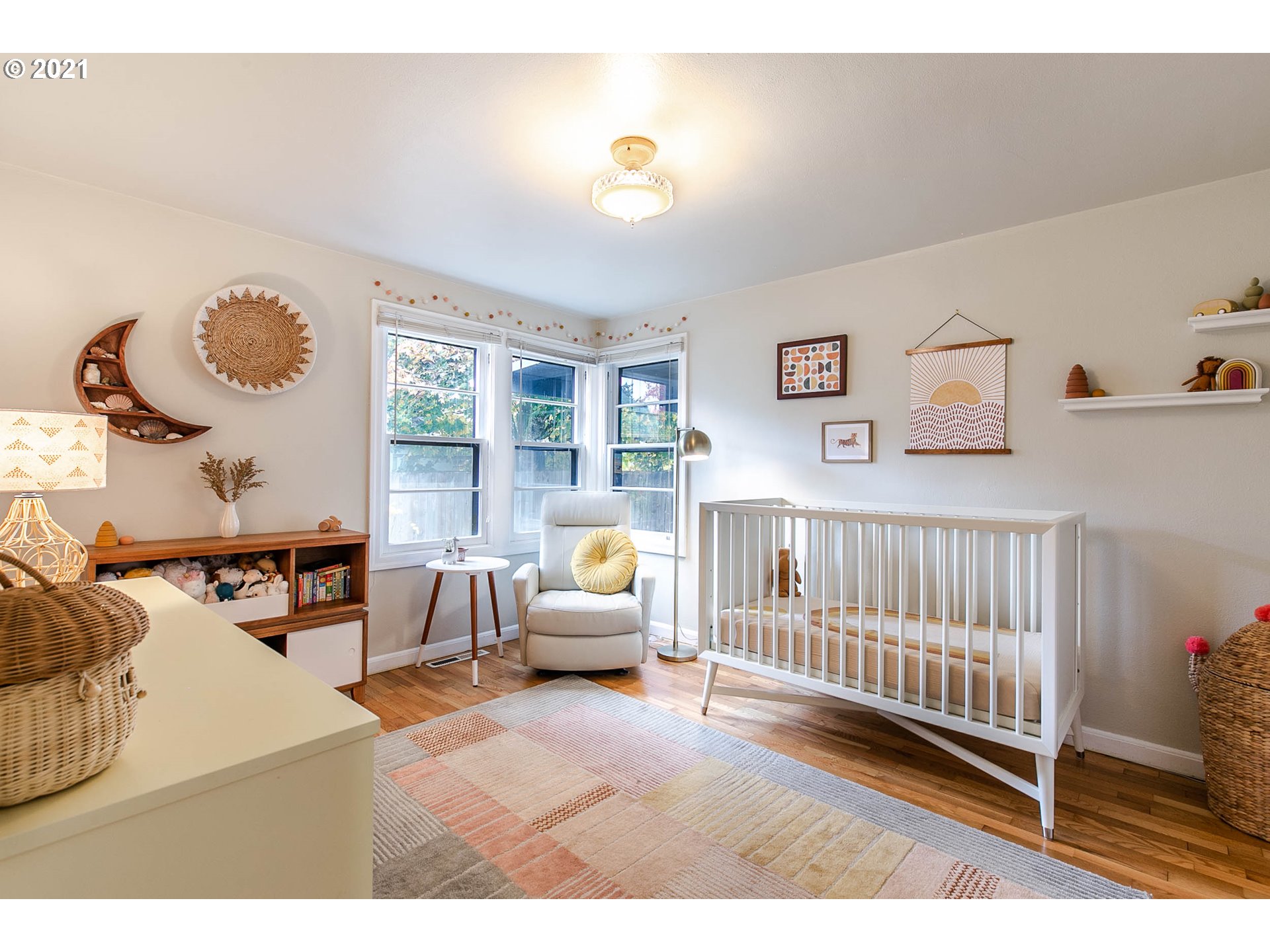 249 8th Street Springfield, OR 97477 - Photo 18 of 32 a bedroom with furniture and a window