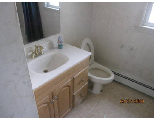 61 Edward Road Townsend, MA 01469 - Photo 8 of 8 a bathroom with a sink and a toilet
