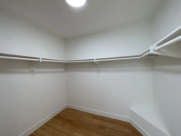 a view of a room with shelf on the wall