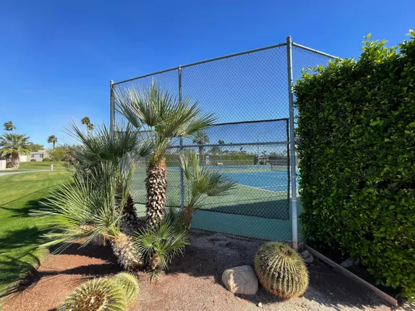 a garden view with a sitting space