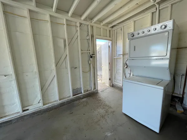 a view of a street with a building in the background