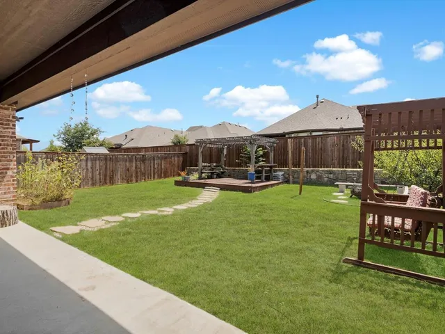 a view of a garden with a slide