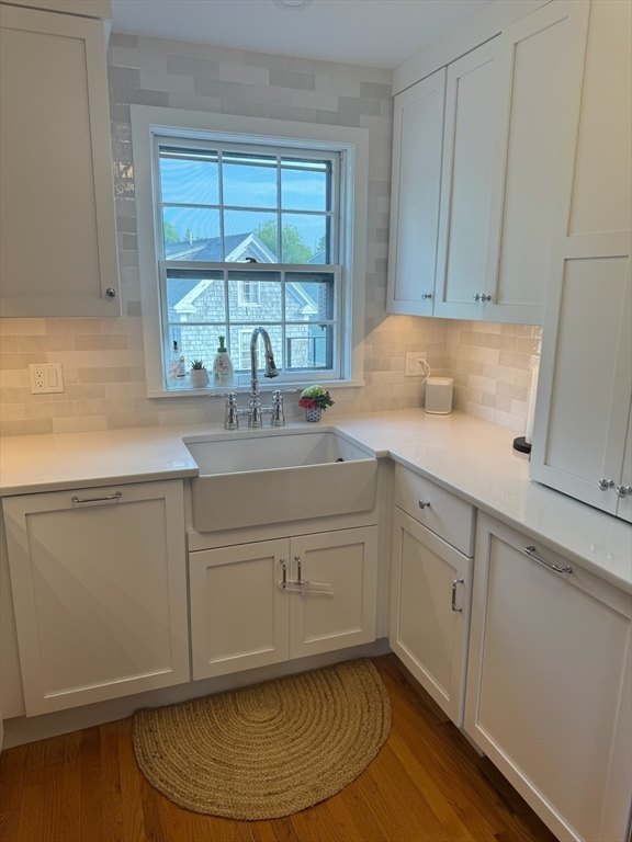 72 Front Street, Unit 4 Marblehead, MA 01945 - Photo 10 of 16 a kitchen with a sink cabinets and window