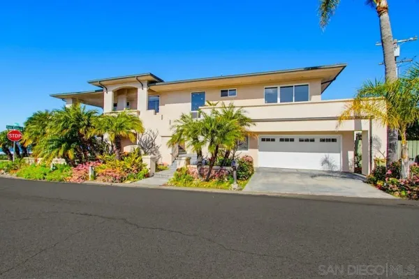 front view of a house with a street