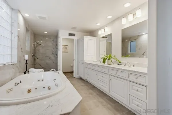 a utility room with cabinets