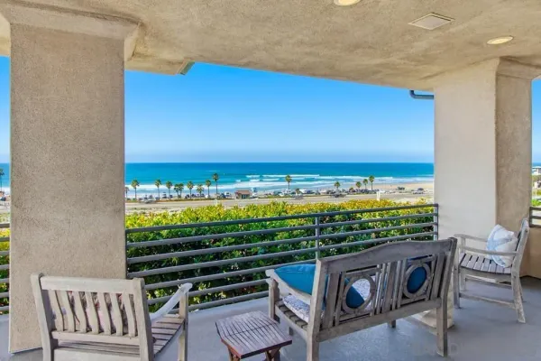 a view of a living room and dining room