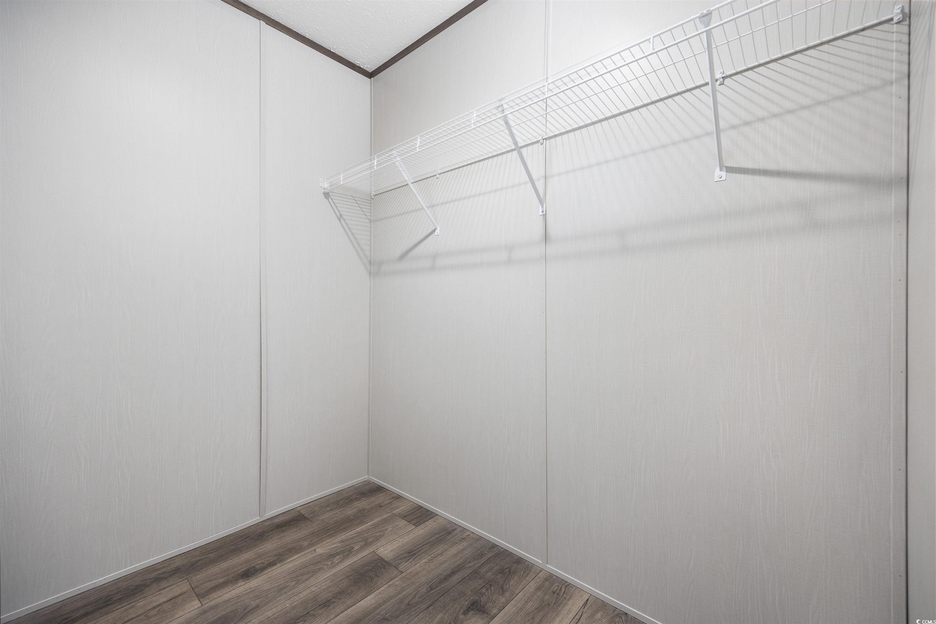 1315 Rabbit Lane Conway, SC 29526 - Photo 16 of 27 Walk in closet featuring dark wood finished floors