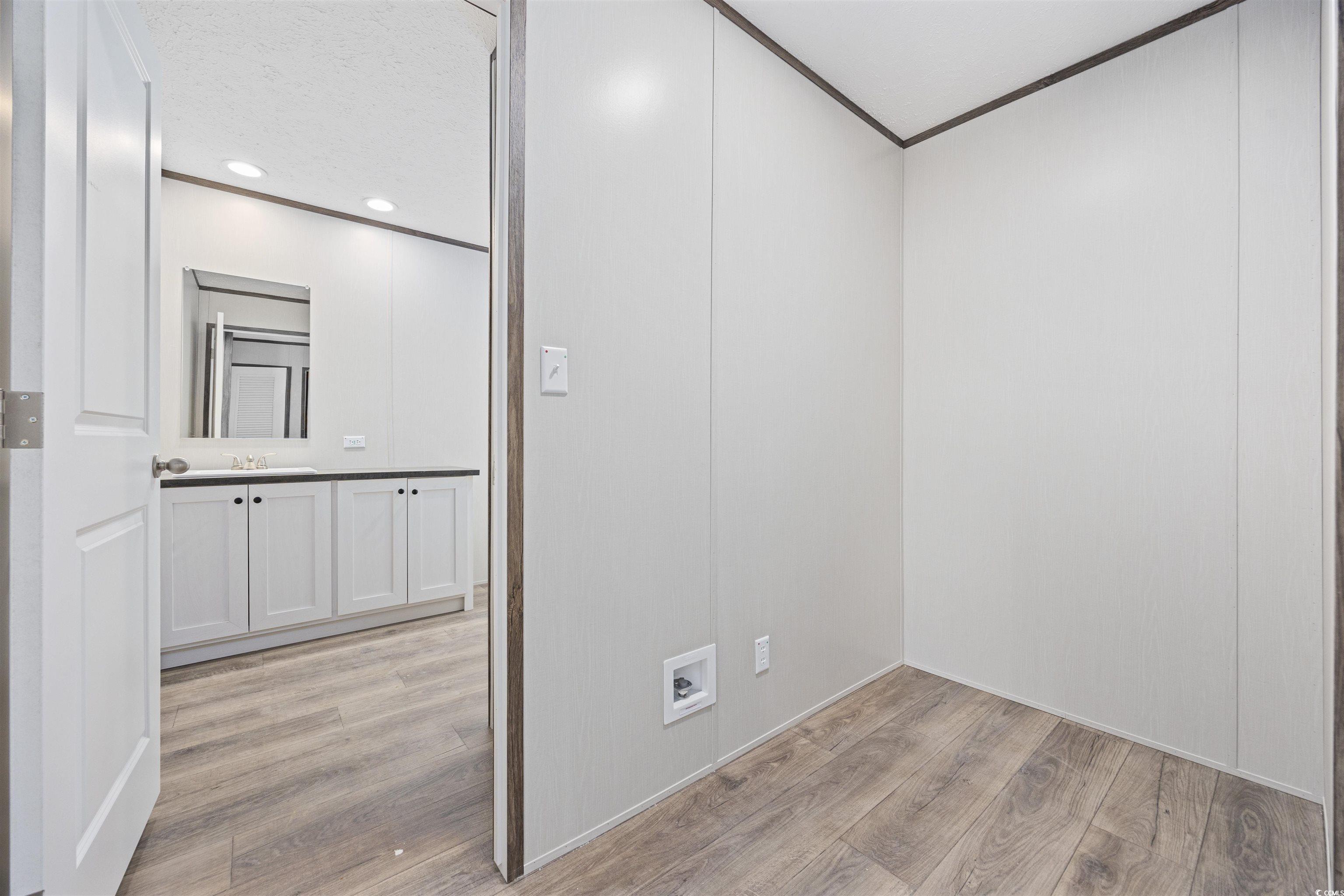 1315 Rabbit Lane Conway, SC 29526 - Photo 20 of 27 Spare room with light wood-style floors and recessed lighting
