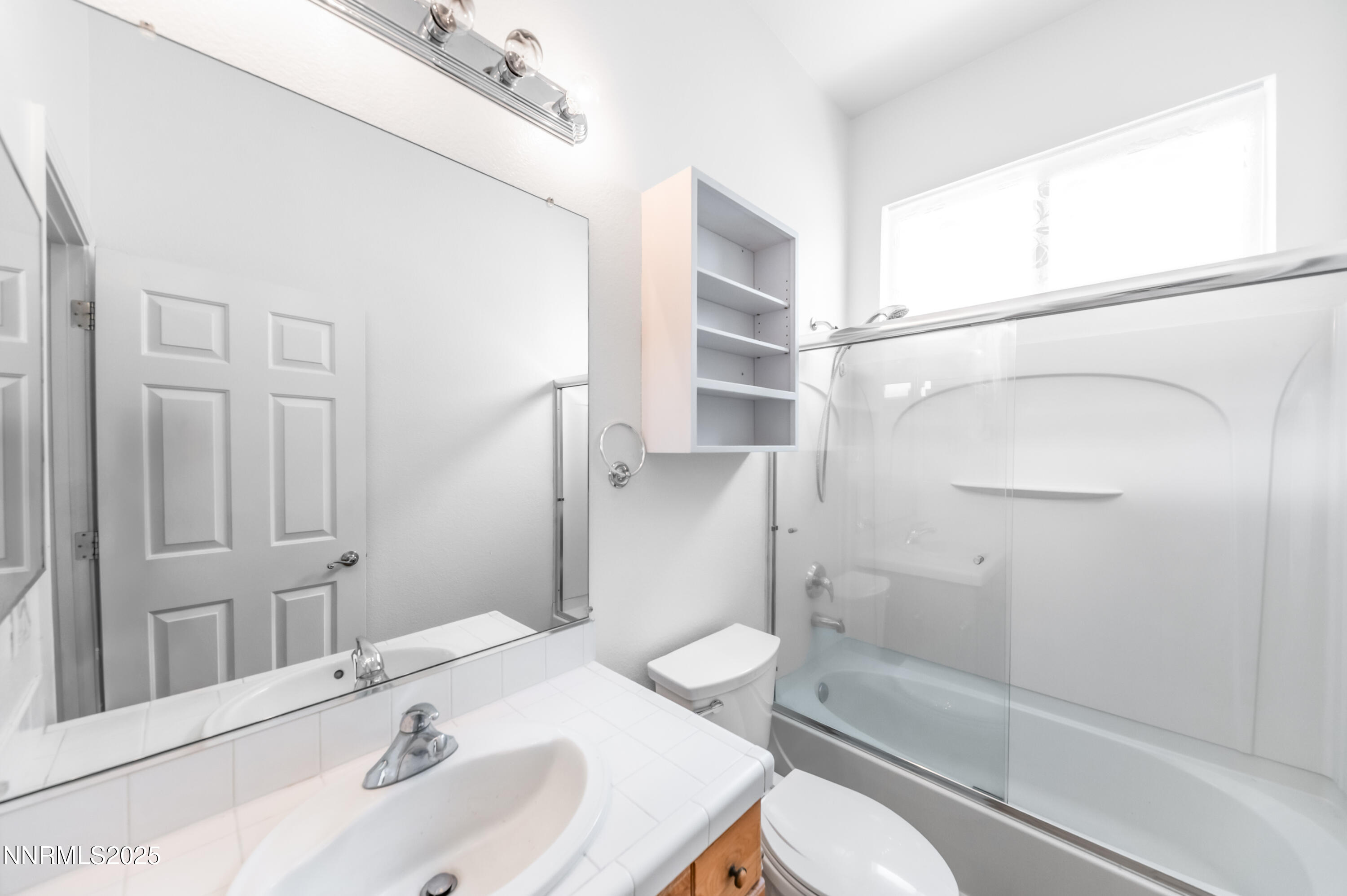 1260 Edgehill Court, Unit ARBOR Reno, NV 89521 - Photo 36 of 50 a bathroom with a sink toilet and shower