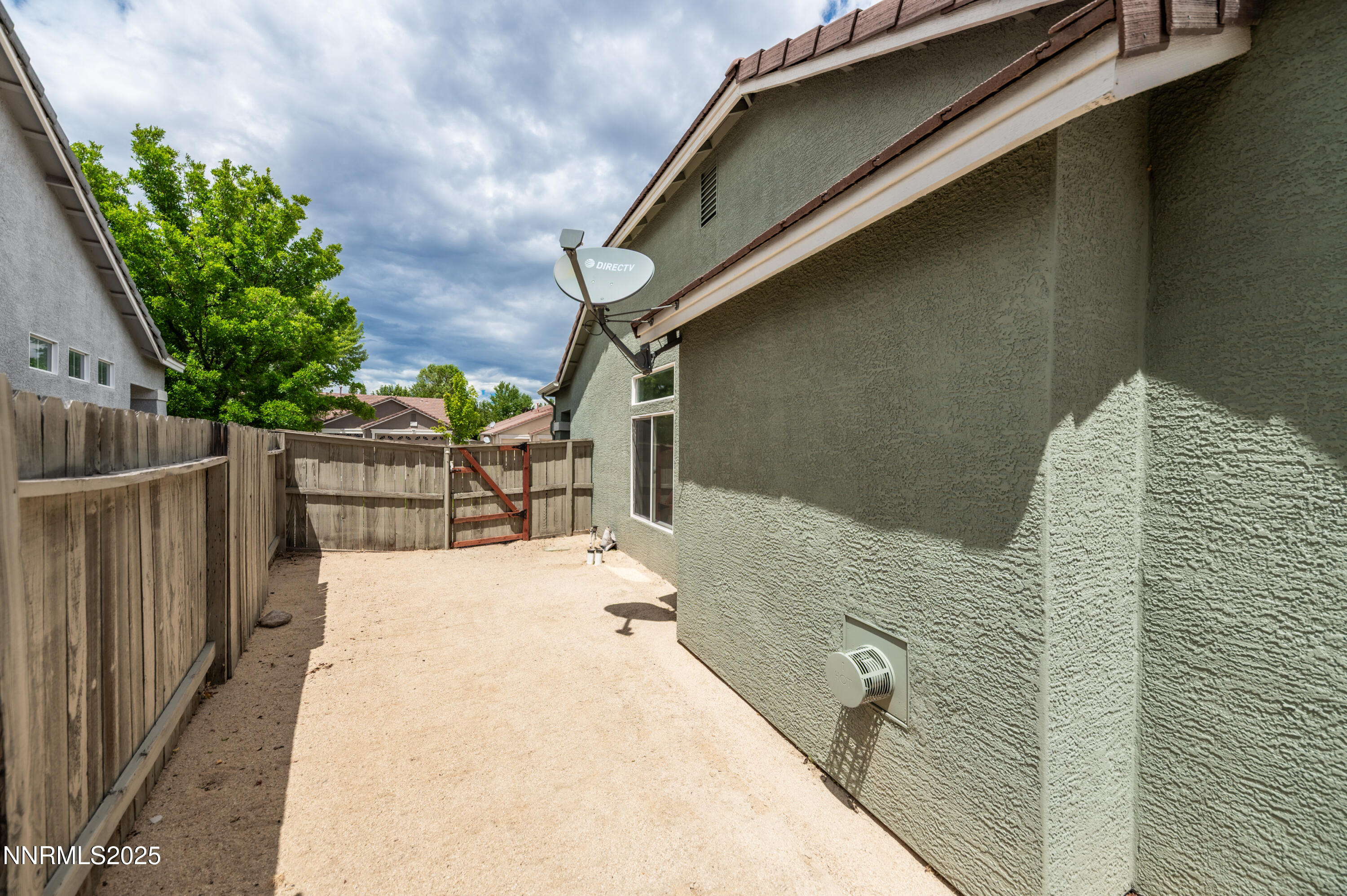 1260 Edgehill Court, Unit ARBOR Reno, NV 89521 - Photo 44 of 50 a view of balcony with wooden floor and fence