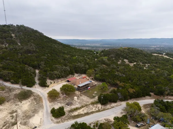 a view of a house with a mountain