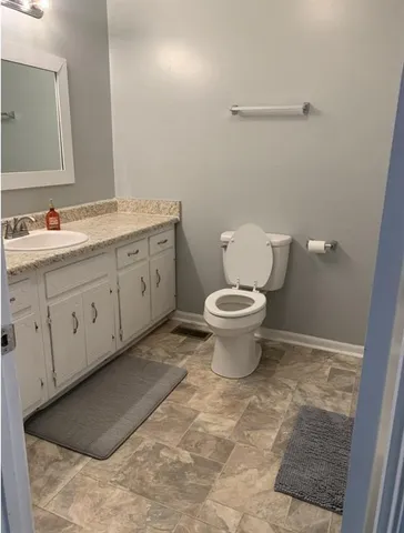 a view of elevator and an empty room