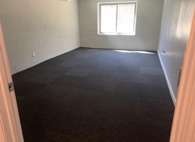 a view of an empty room with a window