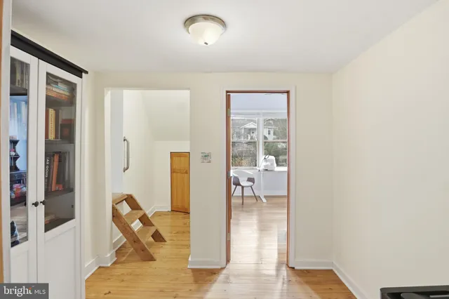 a view of a livingroom with a dinning area hardwood floor and a living room