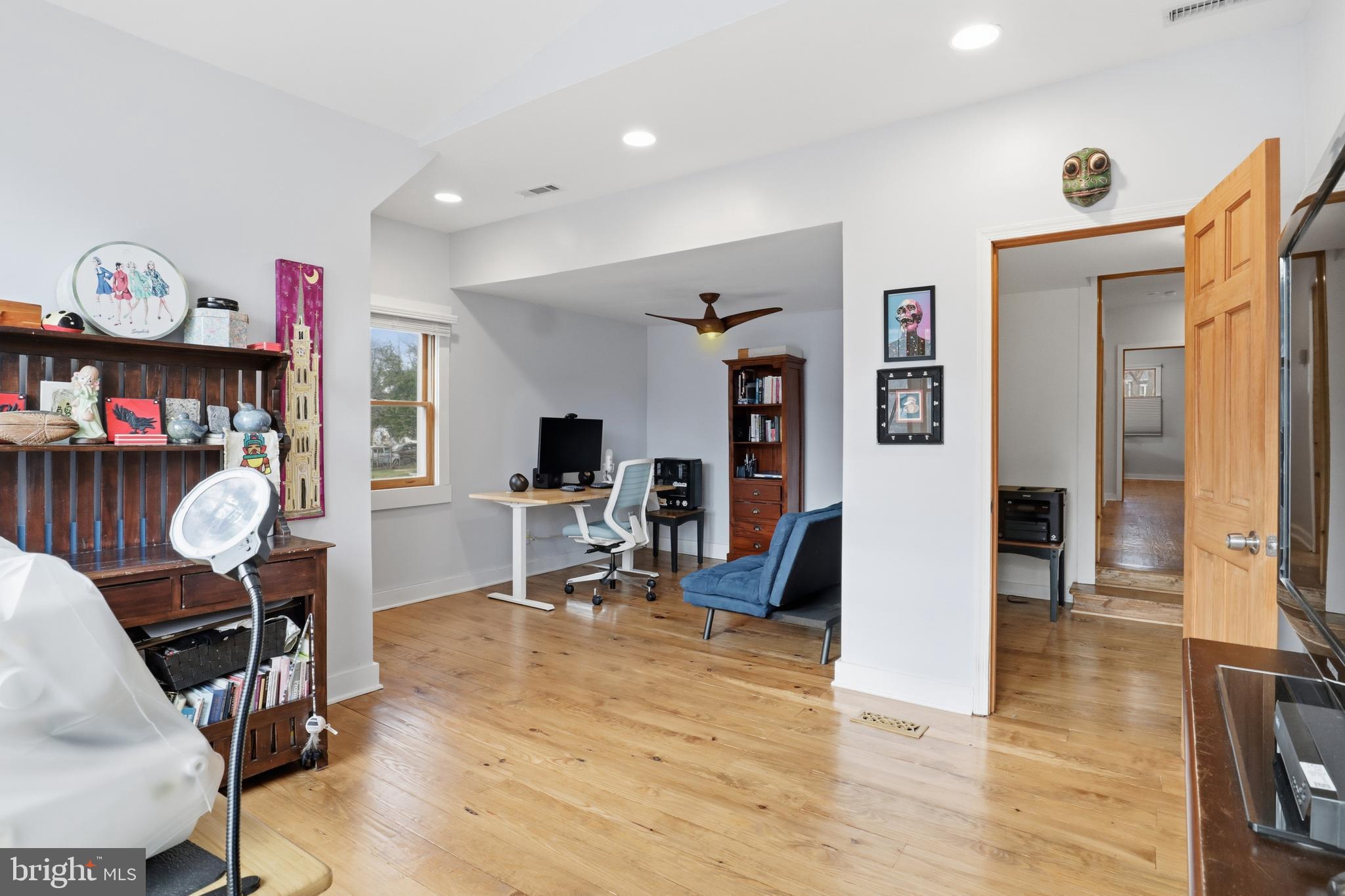 3134 Clayborne Avenue Alexandria, VA 22306 - Photo 25 of 32 a living room with furniture and wooden floor