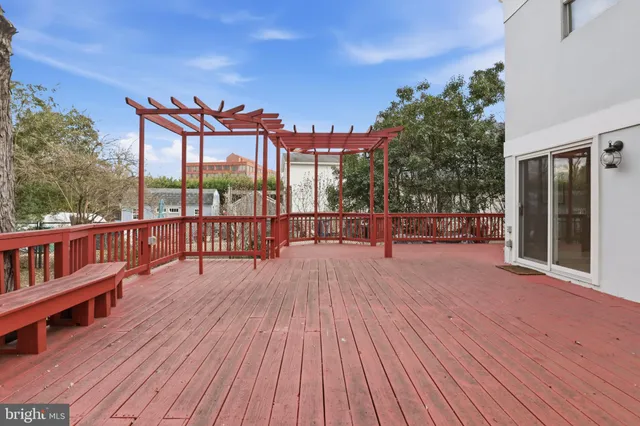 a view of a balcony with furniture