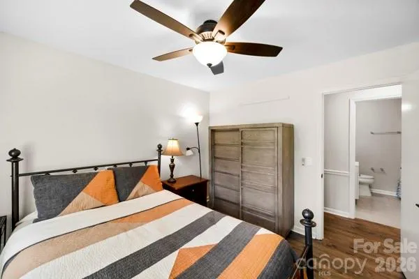 a bedroom with a bed and a walk in closet