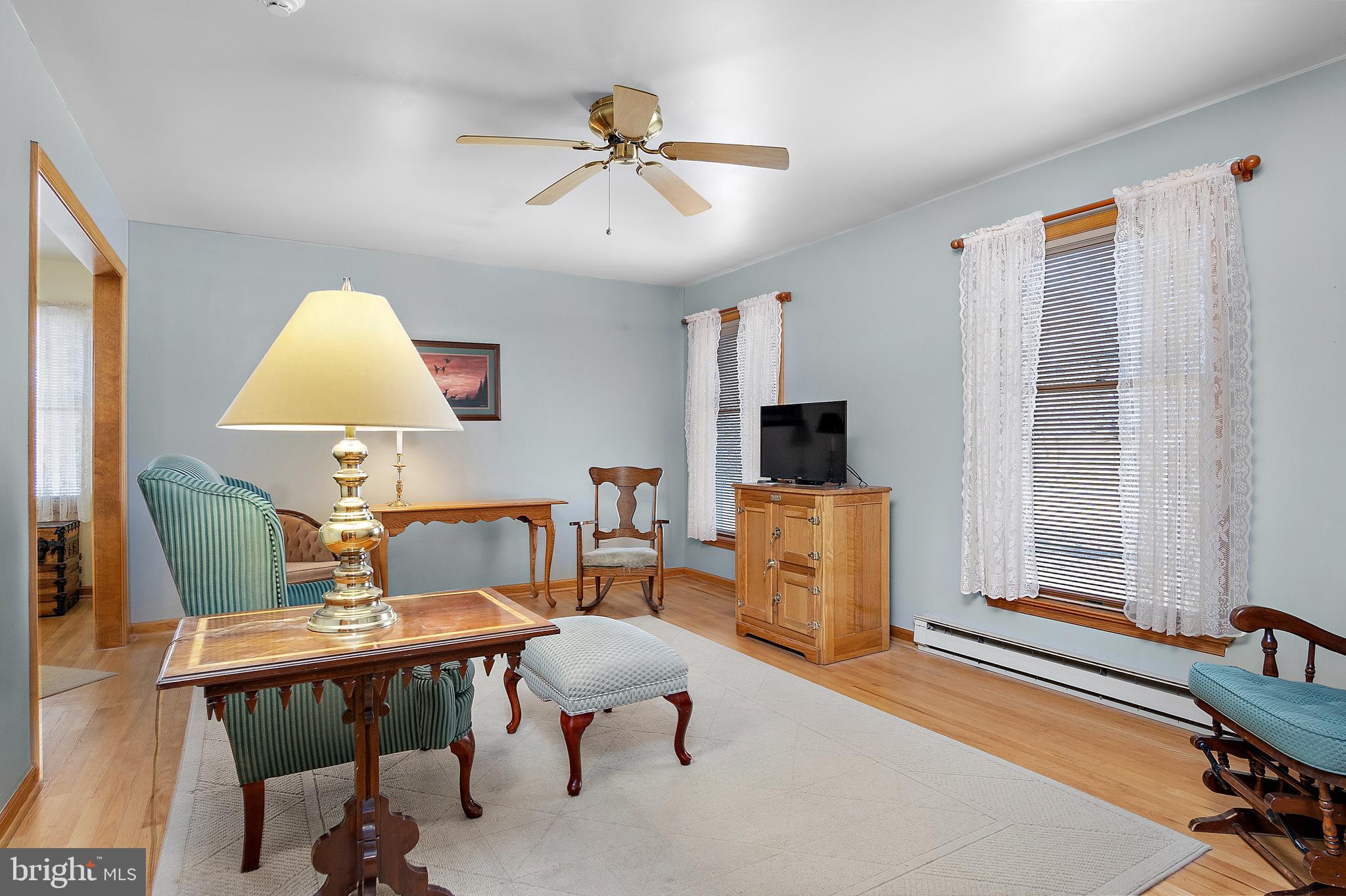 13810 Franks Run Road Smithsburg, MD 21783 - Photo 21 of 72 a living room with furniture and a flat screen tv
