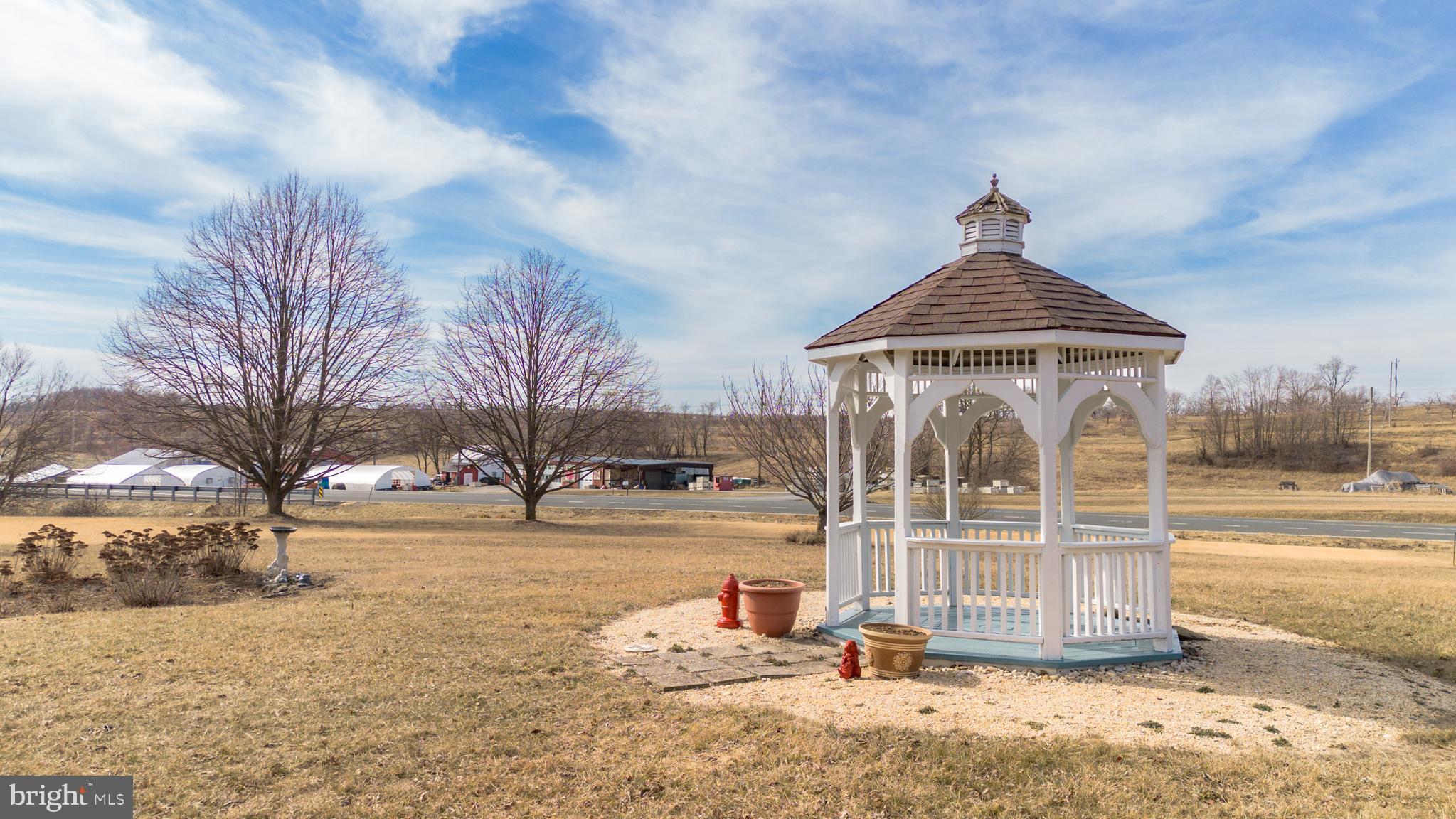 13810 Franks Run Road Smithsburg, MD 21783 - Photo 57 of 72 a front view of a house with a yard