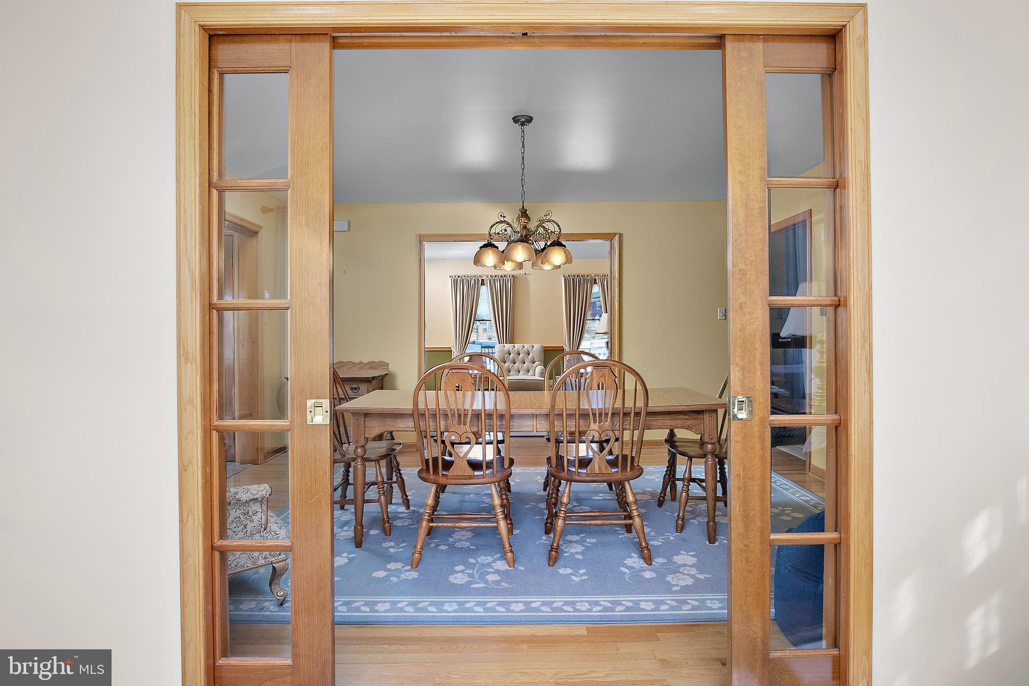 13810 Franks Run Road Smithsburg, MD 21783 - Photo 9 of 72 a view of a dining room with furniture and chandelier