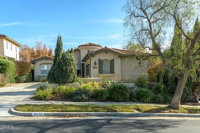 a view of a house with a swimming pool
