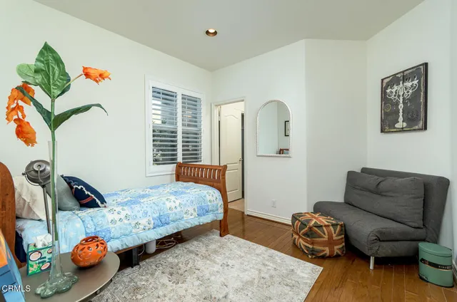 a room with window and ceiling fan